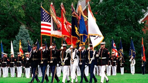 Student Veterans of America – UNL Chapter on field with flags