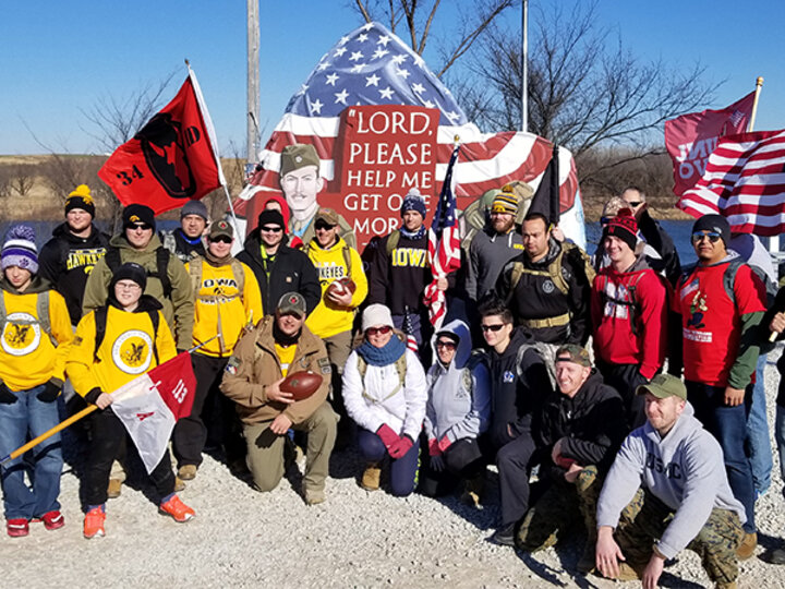 Student Veterans from Nebraska and Iowa meet at Freedom Rock in Menlo, IA during annual Ruck March to raise awareness about veteran health concerns