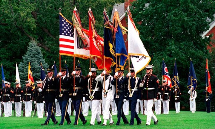 Student Veterans of America – UNL Chapter on field with flags